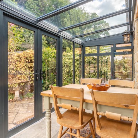 Pass rainy afternoons with tea and cake in the conservatory