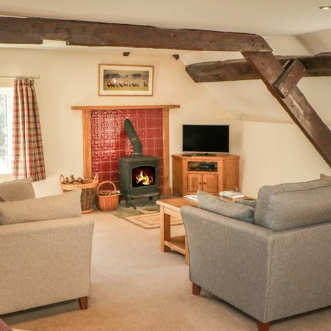 Spend cosy evenings relaxing by the wood burning stove