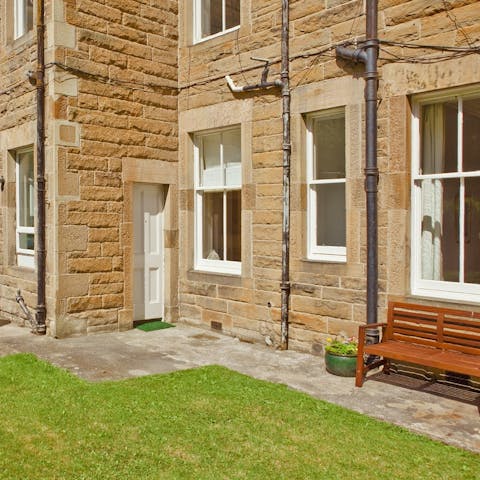 Relax in the large shared garden after exploring Edinburgh