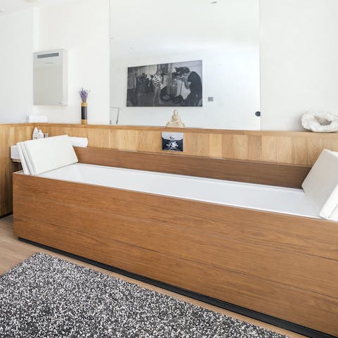 Soak in the master bedroom's unique bathtub