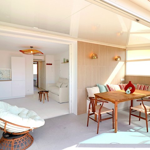 Enjoy the extension of the living space, with seating and dining on the veranda