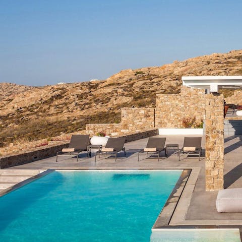 Swim laps of the pristine private pool