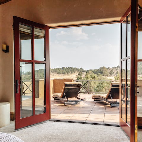 Lounge on the private roof terrace off your bedroom
