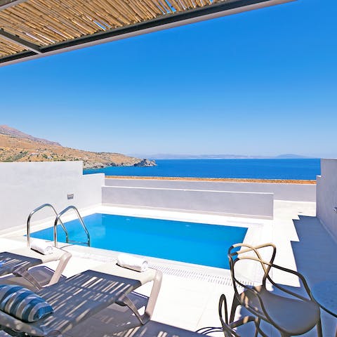 Enjoy uninterrupted sea views from your private poolside terrace