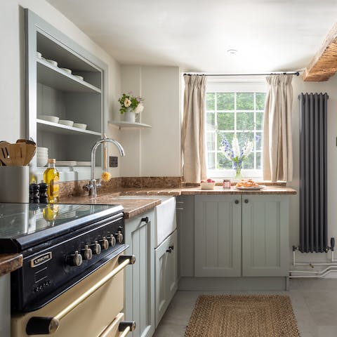 Whip up home cooked meals in the well stocked kitchen