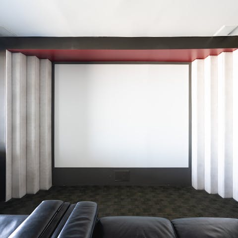 Screen your favourite movies in the home cinema room
