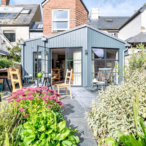 Read a good book alfresco in the pretty plant-filled courtyard