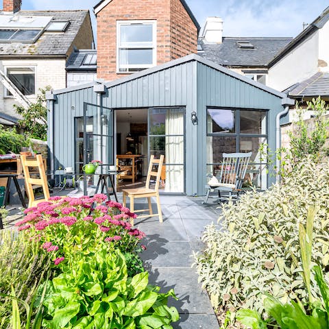 Read a good book alfresco in the pretty plant-filled courtyard