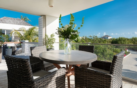 Dine alfresco above the treetops under Caribbean blue skies