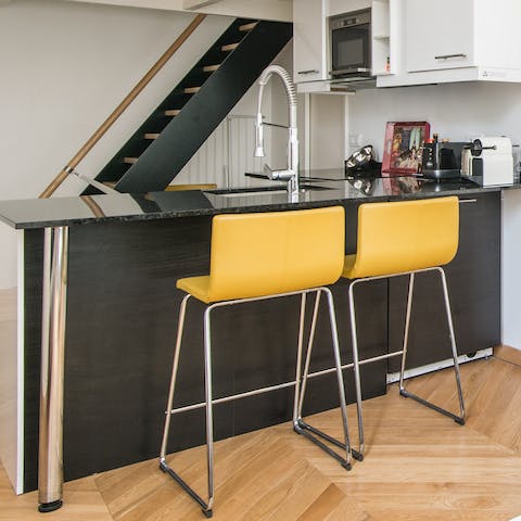 Enjoy your morning coffee and croissant at the chic breakfast bar