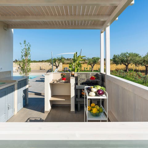 Barbecue some Mediterranean veggies in the outdoor cooking area