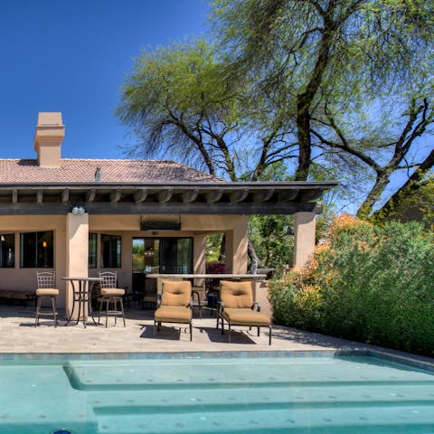 Get the barbecue going for lunch by the pool