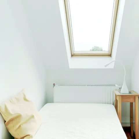 Sleep tight in the chic, minimalist bedroom