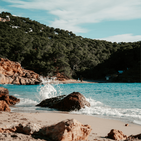 Explore Sant Antoni and its pretty beaches, a short drive away
