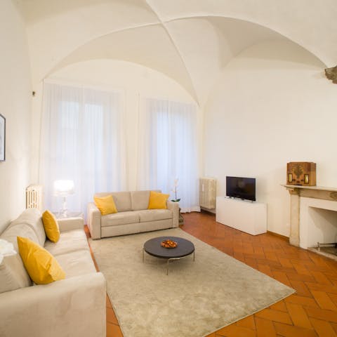 Toast the day's end beneath the historic arched ceilings