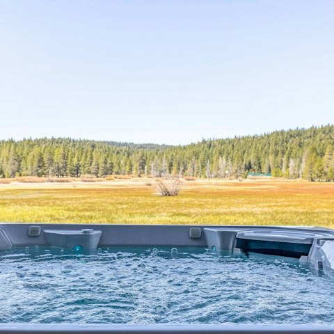 Unwind in the hot tub surrounded by Tahoe’s nature