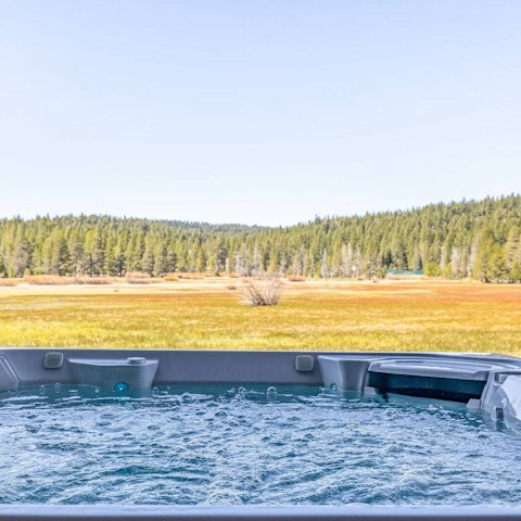 Unwind in the hot tub surrounded by Tahoe’s nature