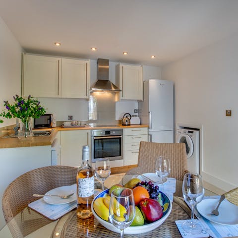 Whip up dinners in the open-plan kitchen and enjoy them together around the table