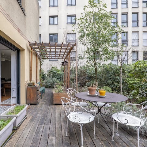 Relax with a glass of French wine in the private garden