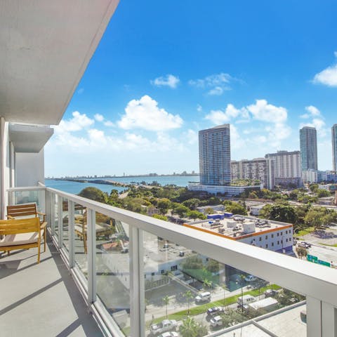 Wake up to sunny views from the private balcony