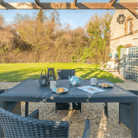 Enjoy a cup of coffee or glass of wine at the outdoor dining area