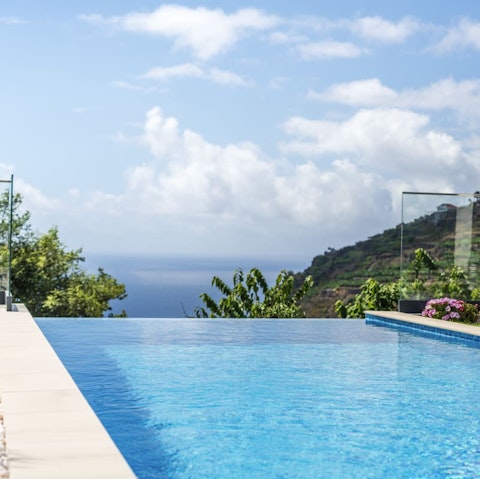 Gaze out over the Atlantic Ocean from the alluring infinity pool