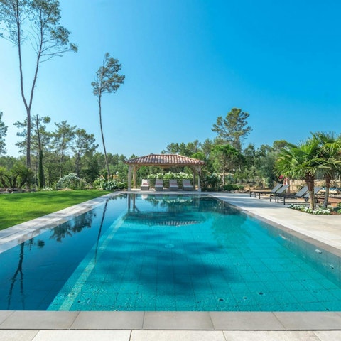 Relax with a glass of French Rosé wine next to the pool