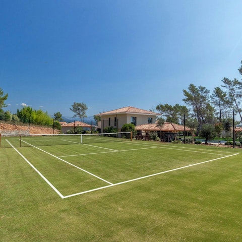 Play a game of tennis on the private court in the Provençale sun