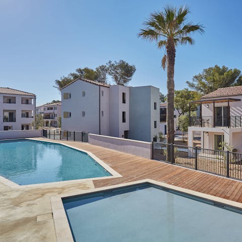 Enjoy refreshing dips in the communal swimming pool