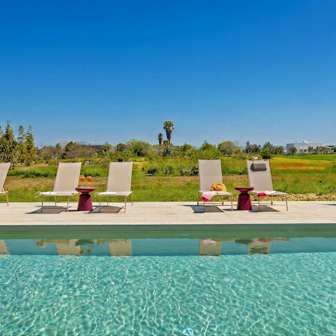 Soak up the Italian sunshine by the swimming pool