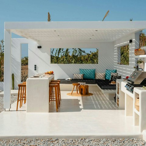 Fire up the barbecue and dine alfresco under the pergola