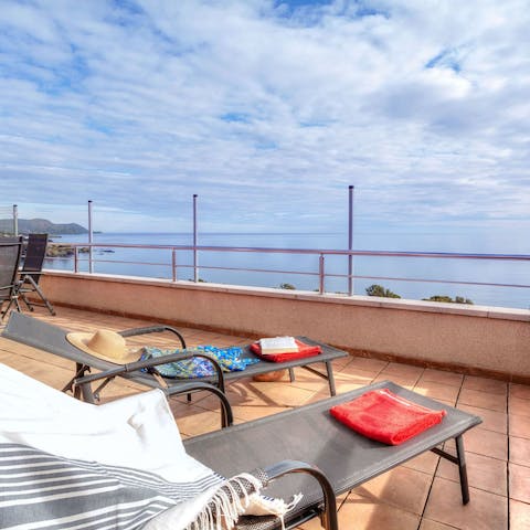 Soak up the Spanish sun on the loungers