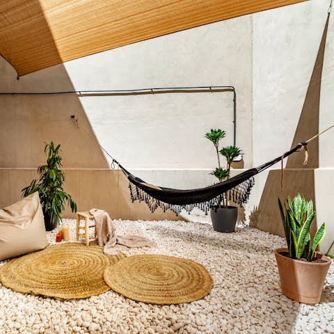 Lounge in the hammock with a good book and a cool drink