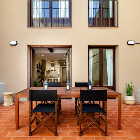 Enjoy a lavish alfresco meal outside on the patio