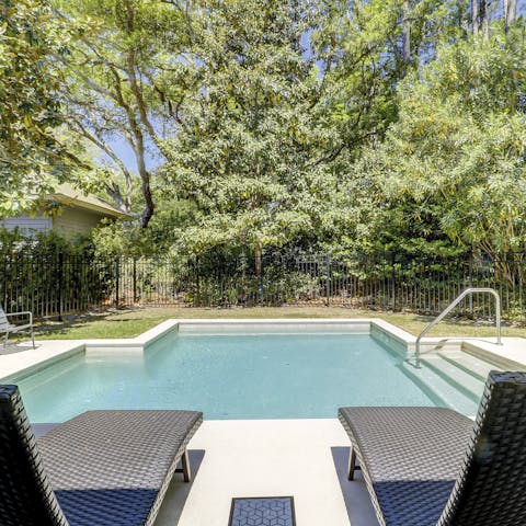 Practice your backstroke while the others relax on loungers