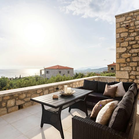 Unwind on the private terrace with sea views