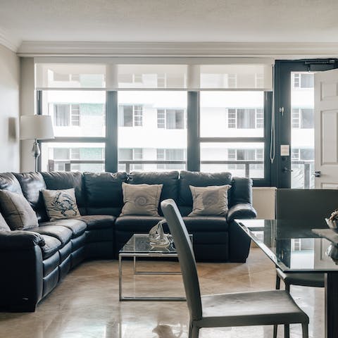 Step out to your private balcony from the glass door in the lounge
