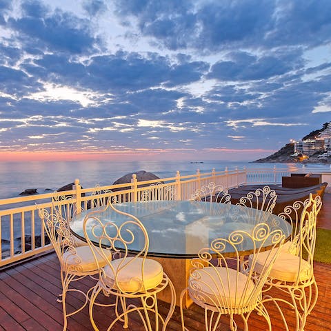 Dine alfresco as the sea stretches out before you and the breeze tickles your skin