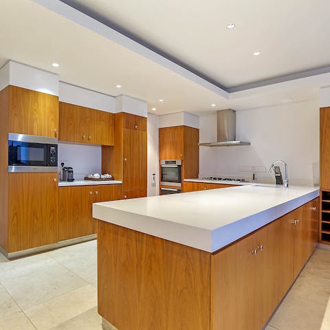 Cook up a storm in your traditional wooden designed kitchen