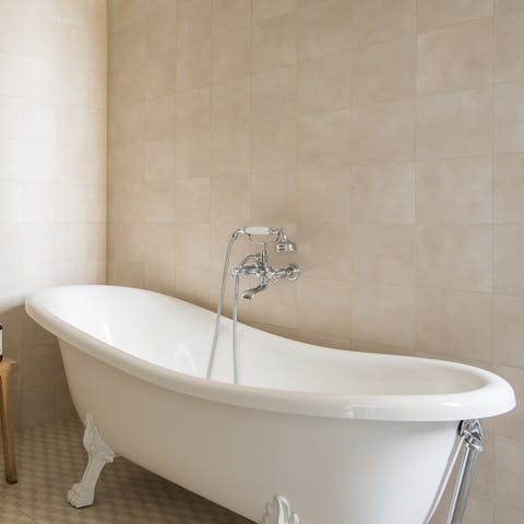 Soak all night in the elegant freestanding tub