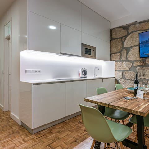 Whip up light meals in the kitchen and sip wine at the table