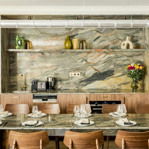 Set the marble table ready for a private chef to cook dinner for you and your guests