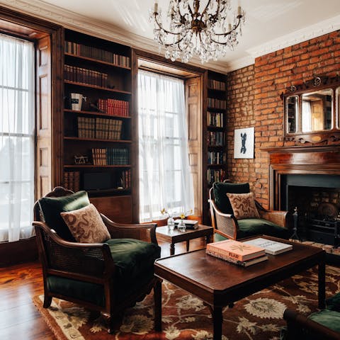 Snuggle up with a book and a cocktail in the cosy lounge