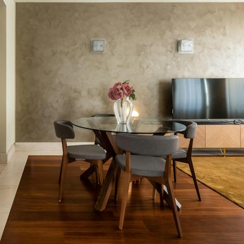 Start mornings with an espresso and pastries at the chic dining table