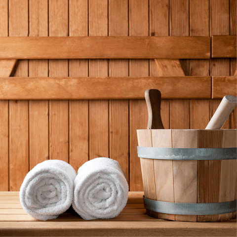 Unwind body and mind in the private sauna
