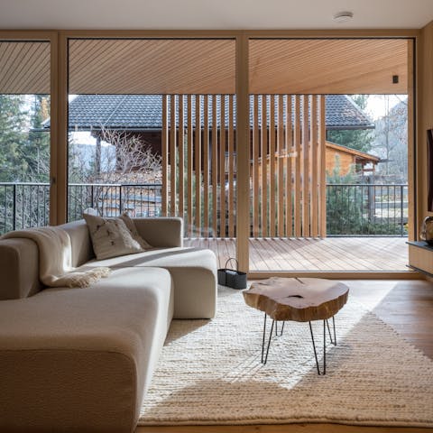 Chill out in the living area, with snow-capped peaks as your backdrop