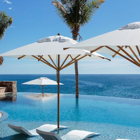 Enjoy spectacular sea views from your poolside perch