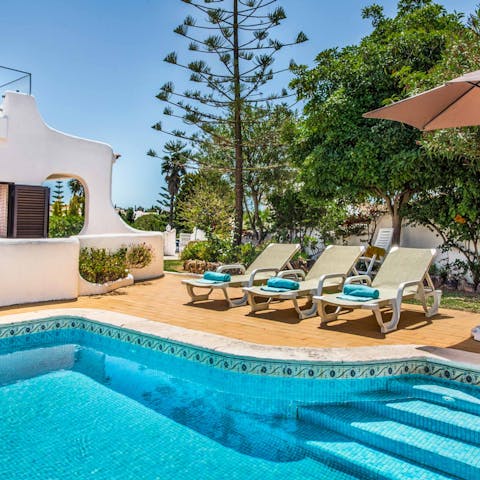 Soak up the sun on the comfy loungers and take a refreshing swim in the glistening pool