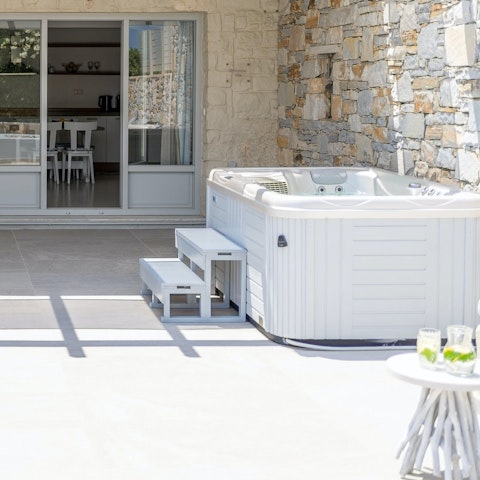 Take a relaxing soak in the private hot tub