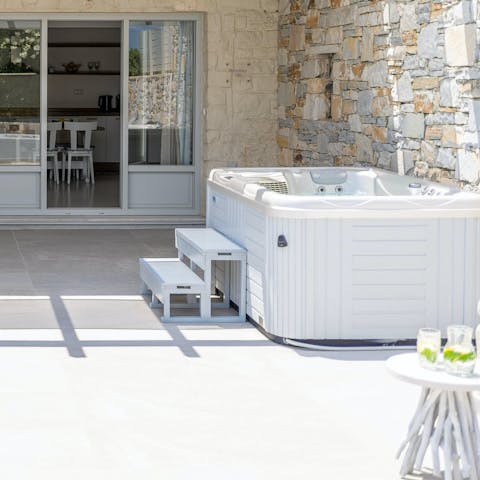 Take a relaxing soak in the private hot tub